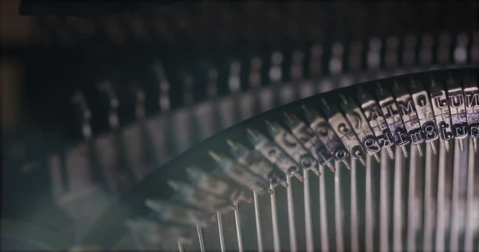 Vintage Typewriter Type Bars Are Shown In Soft Light