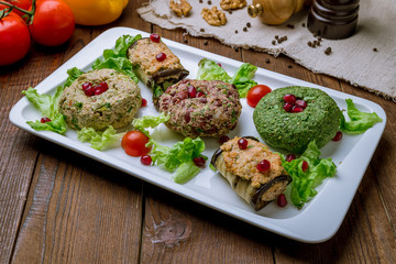 assorted pkhali Georgian cuisine on wooden table