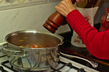 When preparing a tomato sauce, pepper is added to the previous preparation.