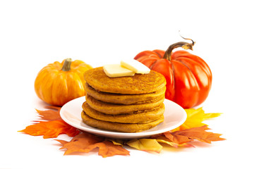Stack of Pumpkin Spice Flavored Pancakes Isolated on a White Background