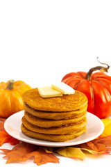 Stack of Pumpkin Spice Flavored Pancakes Isolated on a White Background