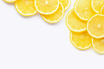 Frame made of fresh lemon with slices on white background.