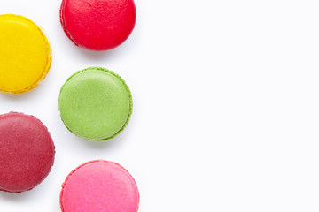 Colorful macarons isolated on white