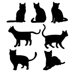 Isolated cats on the white background. Cats silhouettes. Vector EPS 10.