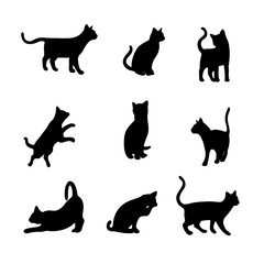 Isolated cats on the white background. Cats silhouettes. Vector EPS 10.