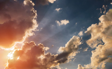 Cloudy sky and bright sunrise over the horizon.