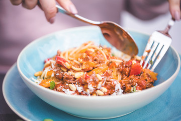 Spaghetti bolognese pasta with tomato sauce and   parmesan cheese and fresh basil
