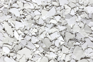 Broken white concrete surface background, plasters crack texture background