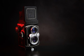 vintage camera twins lens isolated black background