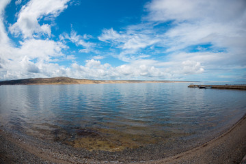 Sea and sky with clouds.
