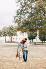 Fototapeta premium love story in Berlin. couple walking on alley in Park..
