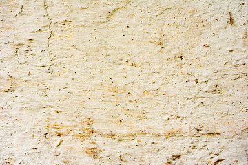 Fototapeta premium Texture of a concrete wall with cracks and scratches which can be used as a background