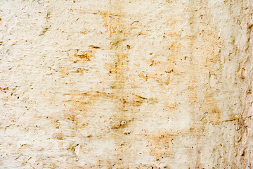 Texture of a concrete wall with cracks and scratches which can be used as a background