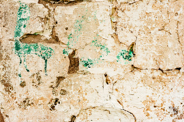 Texture of a concrete wall with cracks and scratches which can be used as a background