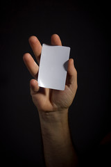 Hand with card