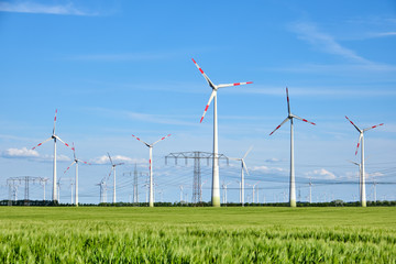 Wind wheels and overhead power lines seen in Germany