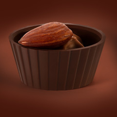 Small chocolate basket with cream and nut on a brown background