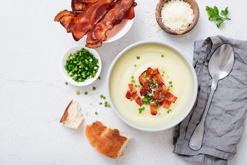Potato cream soup with bacon, green onion and cheese.