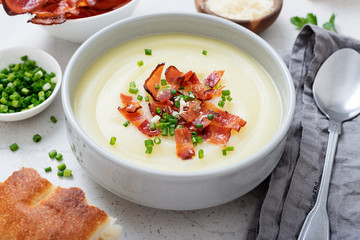 Potato cream soup with bacon, green onion and cheese.