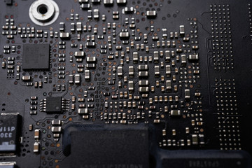 A black colour waterproof Printed Circuit Board with CPU, SMD & IC mounted part on board