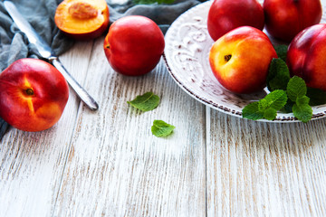 Plate with fresh nectarines