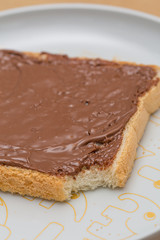 Chocolate sauce on bred close up still