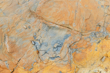 Crushed rock background. Cracked structure, abstract motif.