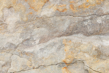 Crushed rock background. Cracked structure, abstract motif.