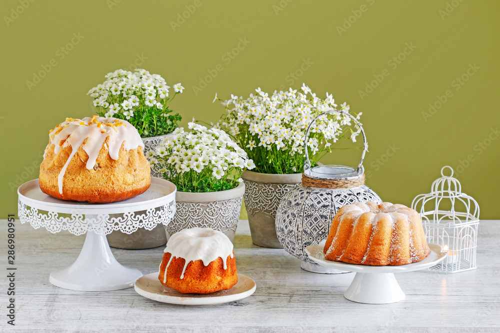 Canvas Prints traditional easter cakes and white flowers on the table.