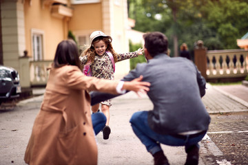 happy schoolgirl at after class at first day of school.
