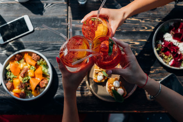 woman eating fruit salad