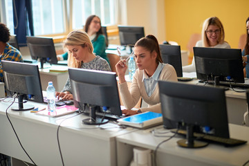 Girl on class at IT workshop at university..