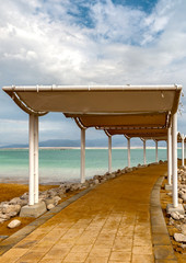 Sandy beach at the Dead sea resort, Israel