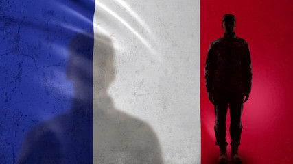 French soldier silhouette standing against national flag, proud army sergeant
