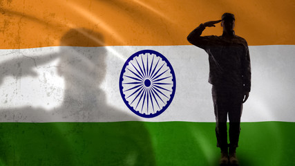 Indian soldier silhouette saluting against national flag, professional army