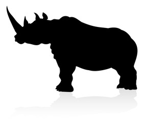 Naklejka premium A rhino or rhinoceros safari animal silhouette