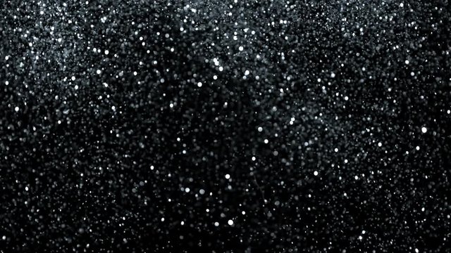 Silver Glitter Background in Super Slow Motion at 1000fps. Shooted with High Speed Cinema Camera in 4K Resolution.