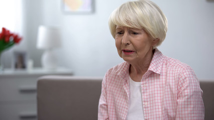 Fototapeta na wymiar Terminally ill senior lady suffering depression, fatal disease health problems