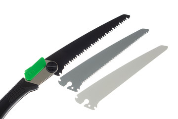 Folding handsaw and replaceable blades isolated on white