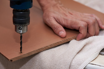 Drilling wood for a hole