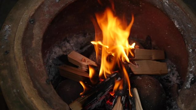 Flames in a firepit in slow motion