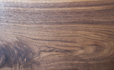 Texture of black walnut board with oil finish