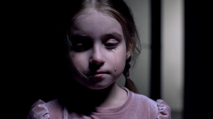 Little kidnapping victim crying on camera, child abuse, domestic violence result