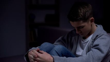 Teenage domestic violence victim feeling fear, needs help in hopeless situation