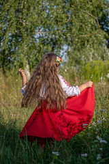 girl dancing in a red dress