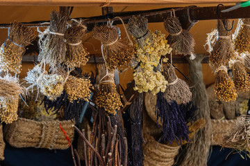 Dry flowers and some herbs for sale in a traditional fair.