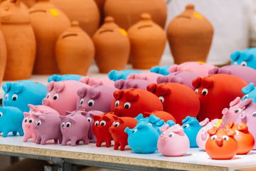 Close up of colorful Piggy Banks And Other Potteries