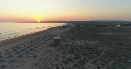 Aerial Sunset Seascape of Salgados Beach in Albufeira, Algarve, Portugal.