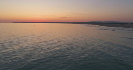 Aerial Sunset Seascape of Salgados Beach in Albufeira, Algarve, Portugal.