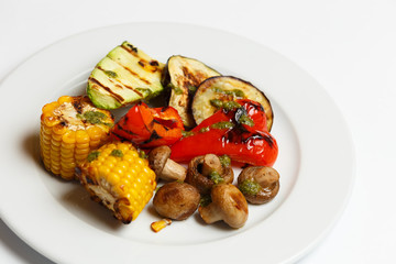 grilled vegetables in assortment on white background